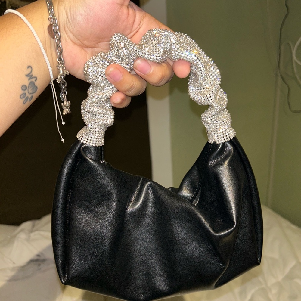 Elegant Black Leather Handbag with Silver Accents